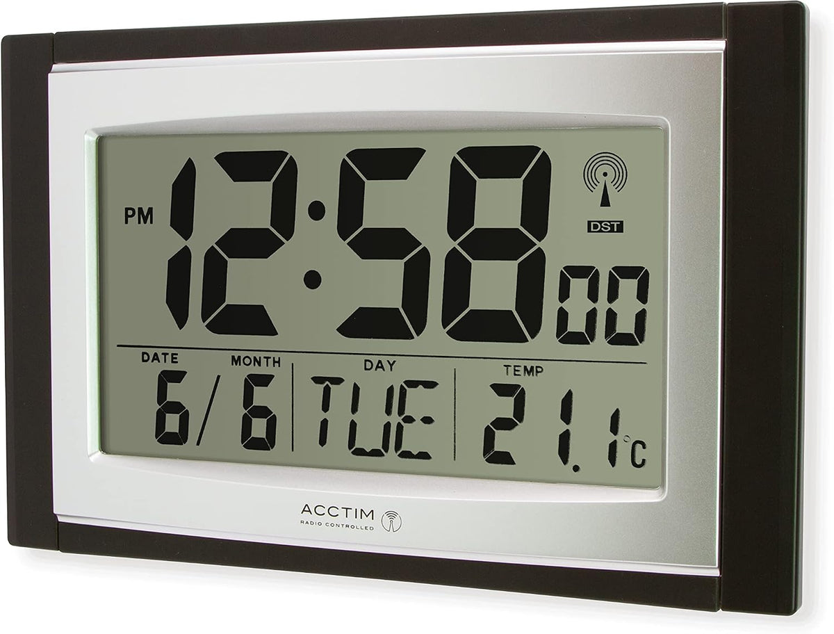 Acctim Stratus radio controlled digital wall and desk clock with LCD display showing date day and temperature, battery powered kitchen or office clock with tabletop or wall mounting in black